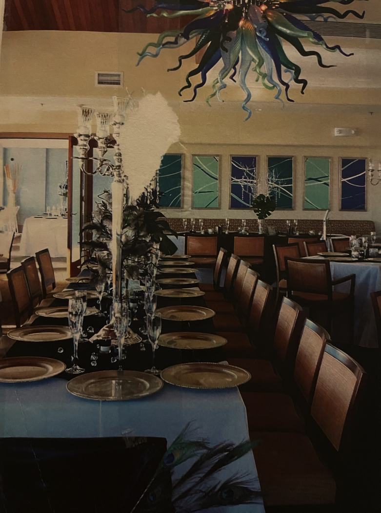 Dramatic artwork displayed in an upscale restaurant dining room