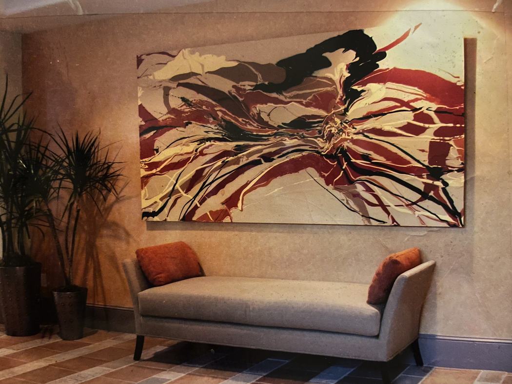 Large abstract painting in a boutique lounge setting
